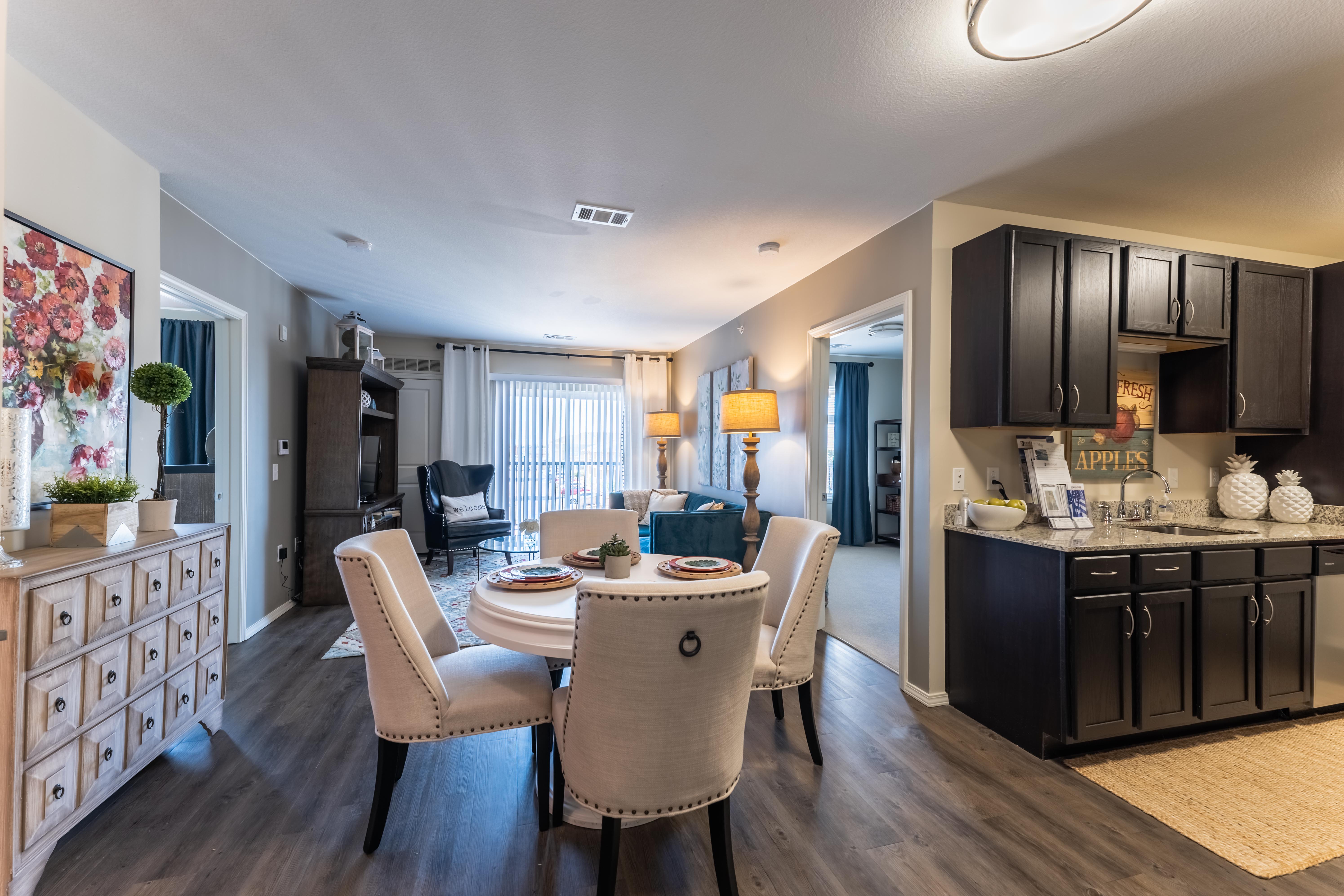 Living and dining area at The Cedars at Woodland Hills
