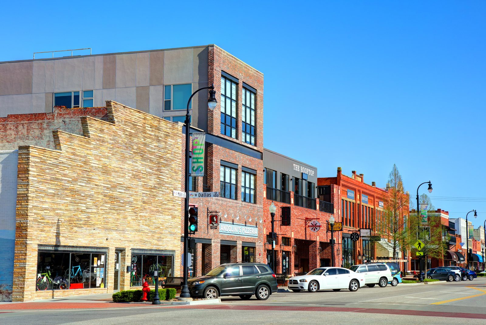 Shops and restaurants along a brick street